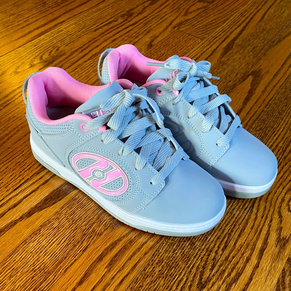 Youth size 4 (women size 5) Heely’s wheeled shoes. Brand new, never worn